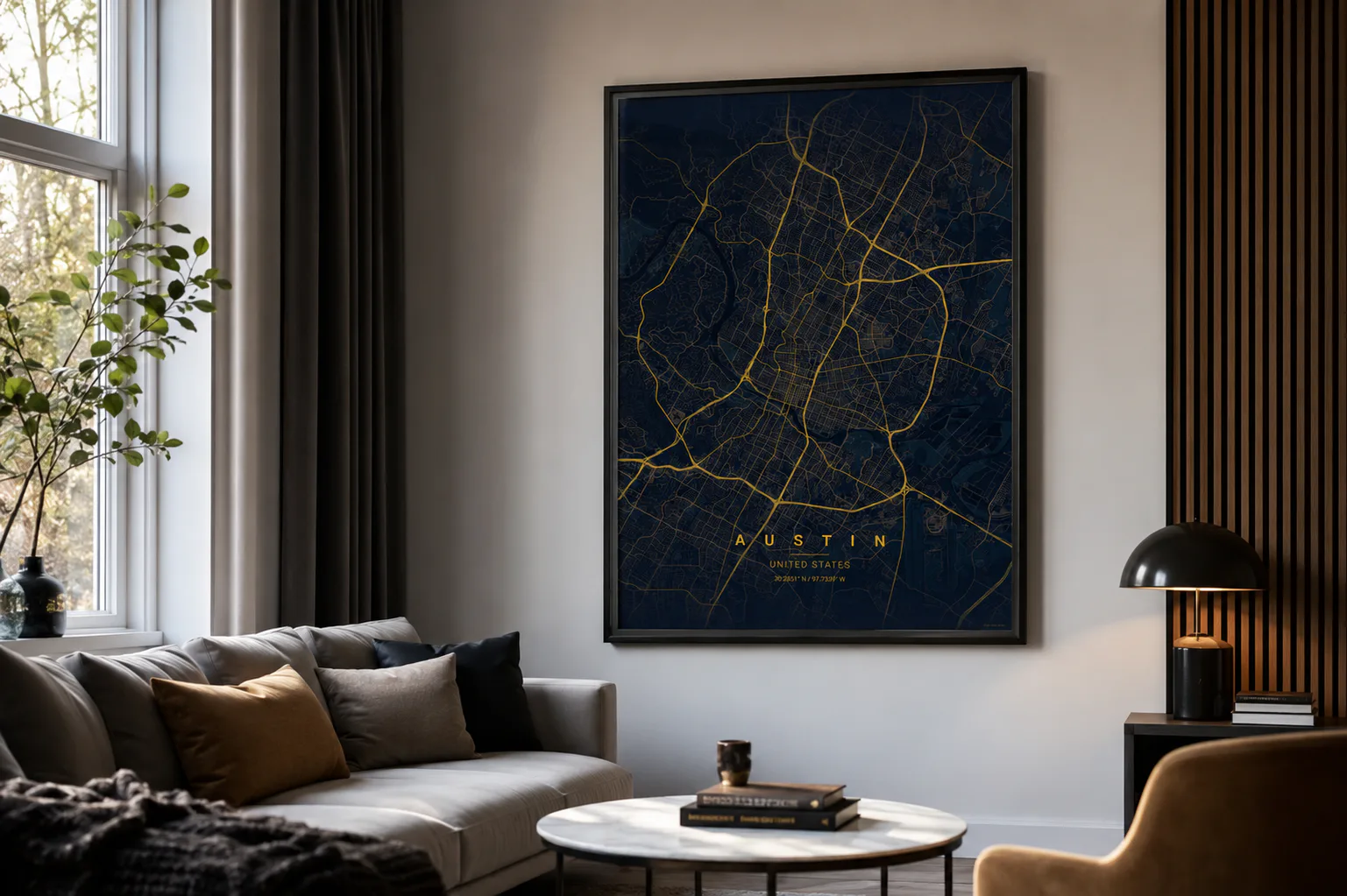 Framed Austin map poster above a sofa in a calm modern living room
